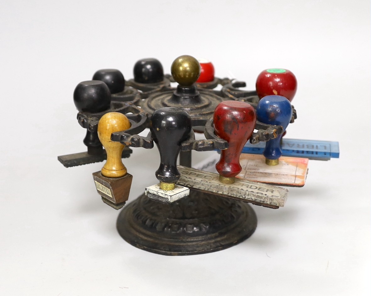 A cast iron stamp dispenser